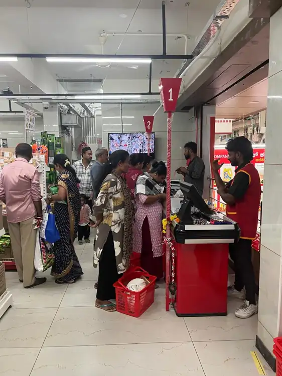 Customers shopping at the Price Company Arekere launch
